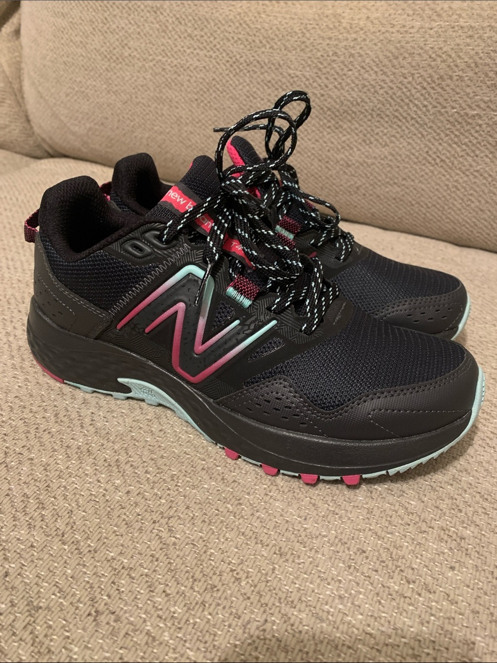 New Balance Women's Black Athletic Sneakers with Pink & Mint Accents